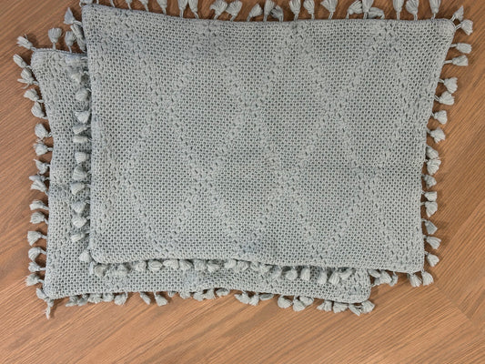 PAR DE FUNDAS NAVIGATOR/ POMPONES VERDE AGUA 35x50