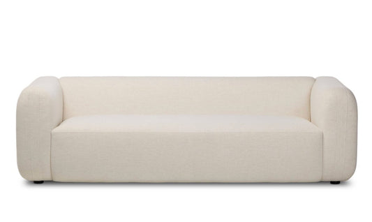 SOFÁ NARAS EN TELA CREMA CON PIES DE MADERA